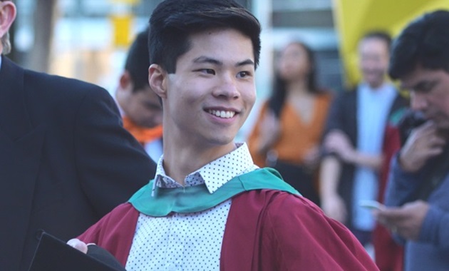 A Murdoch University graduate wearing his academic regalia