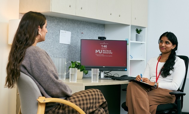 Counselling students in clinic