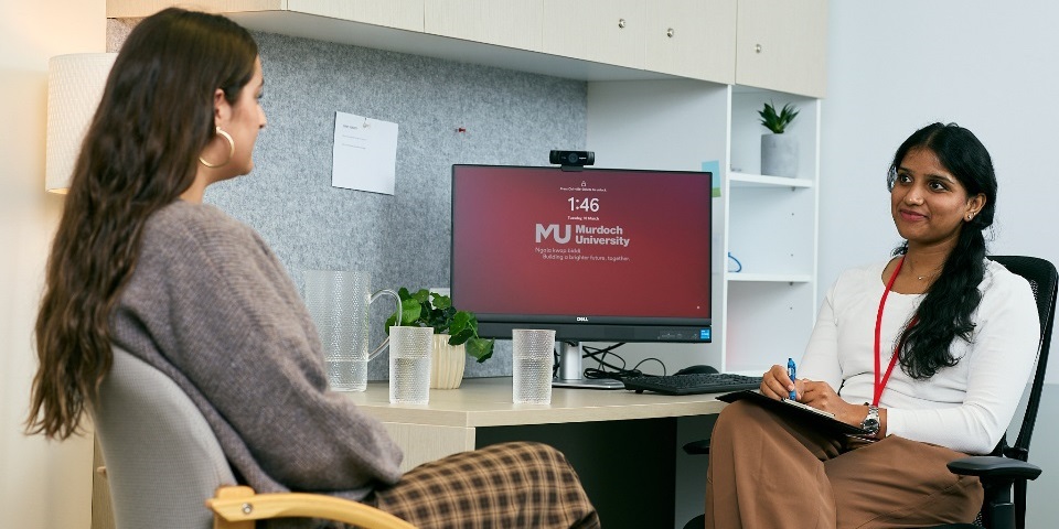 Counselling students in clinic