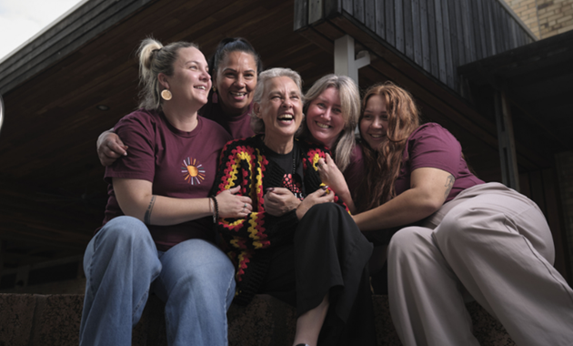 Jodie Clarke, a Murdoch University researcher and community leader, engaging with families and service providers at the Champion Centre, supporting Aboriginal communities through relationship-based care.