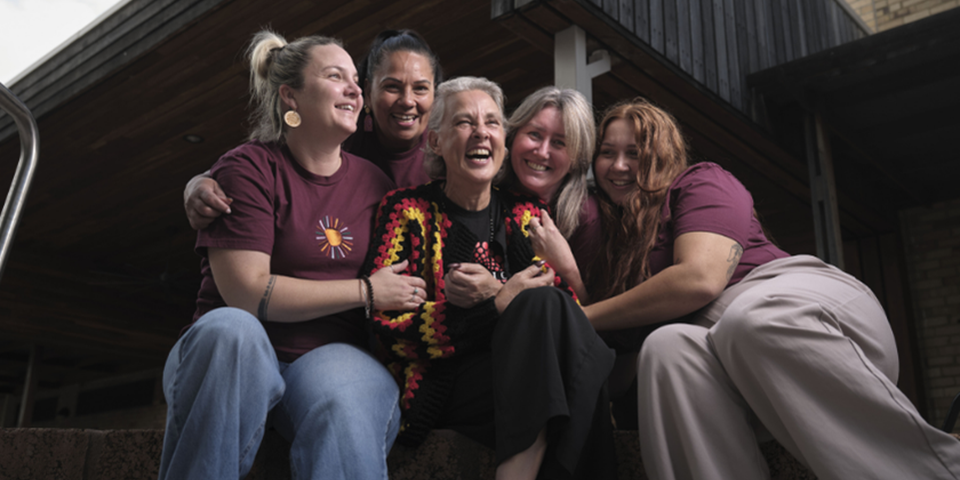 Jodie Clarke, a Murdoch University researcher and community leader, engaging with families and service providers at the Champion Centre, supporting Aboriginal communities through relationship-based care.