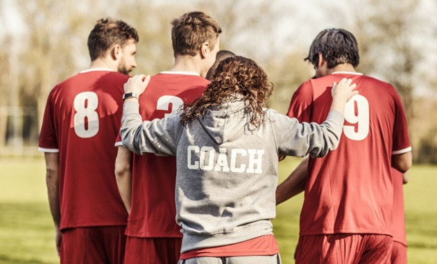 Coach with players