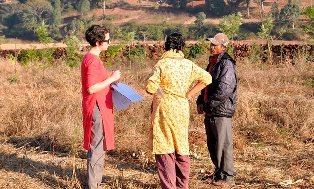 Erin Sweeney with farmers in India