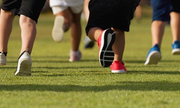 Feet view of kids running