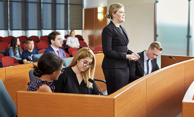 Female law student in mock court