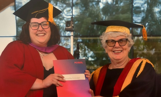 Gail McGowan awarding degree to Murdoch student Samantha Ferguson