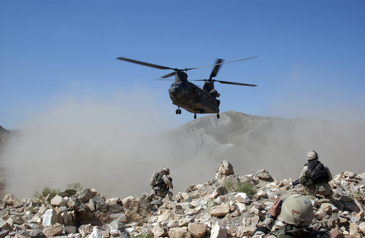 Clouds of dust kicked up by the rotor wash of a CH-47 Chinook helicopter in Afghanistan. Clouds of dust kicked up by the rotor wash of a CH-47 Chinook helicopter in Afghanistan. (Credit: Stocktrek Images/Getty Images).