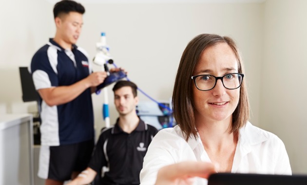 Students and their professor testing brain function