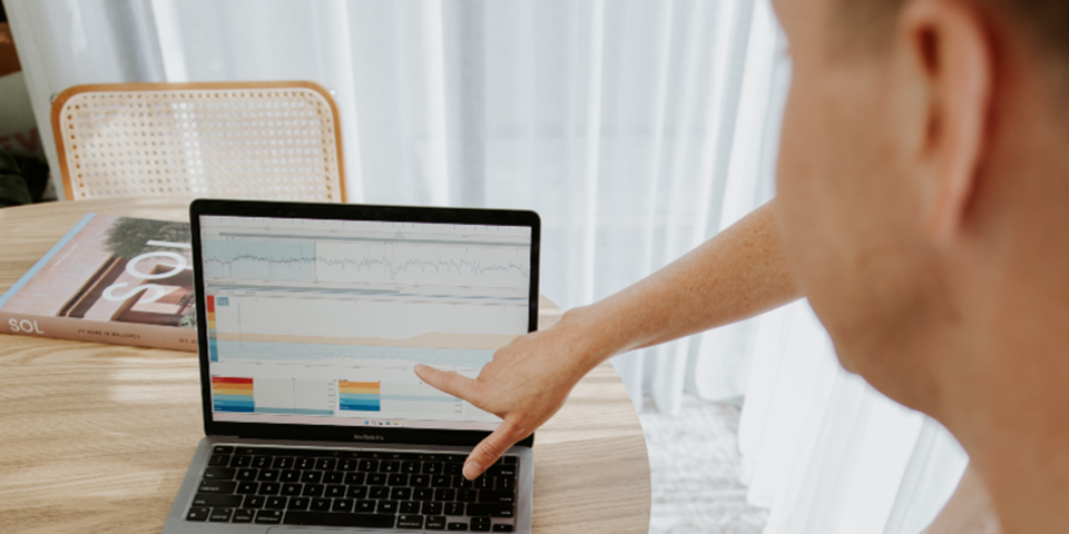 Man monitoring his heart rate on a laptop