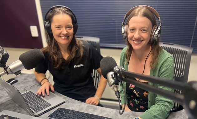 Kylie Ridder and Dr Kimberley Beasley smiling at camera in podcast studio