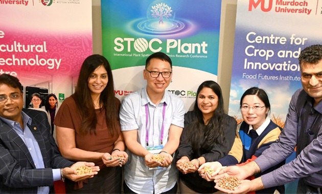 Professor Rajeev Varshey FRS FAA, CCFI co-authors and lab members display peanuts at STOC Plant 2026.
