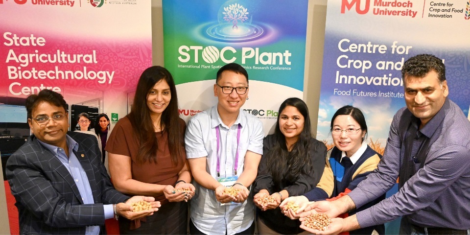 Professor Rajeev Varshey FRS FAA, CCFI co-authors and lab members display peanuts at STOC Plant 2026.