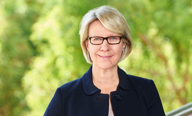 Professor Eeva Leinonen with vegetation in background