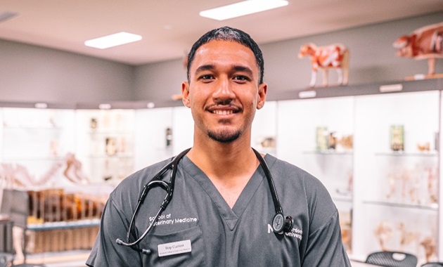 Roy Curion standing in Murdoch Vet Museum.