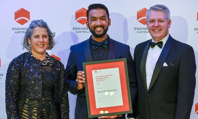 Group photo of Mitrayan (Ryan) Rao (standing in the middle holding his award) with Dr Nick Fleming (on the right) and CEO of Engineering Australia Romilly Madew (on the left)