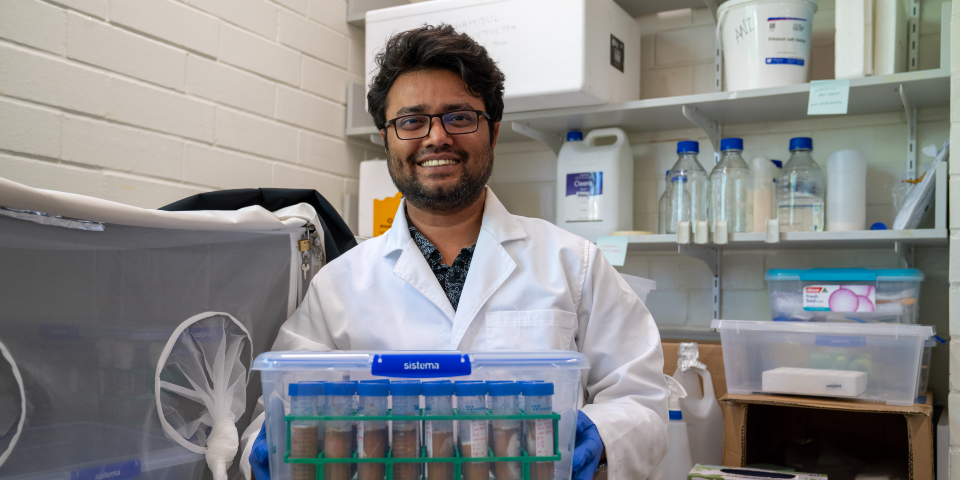 Headshot of PhD student Shahidul Khan in his lab coat.