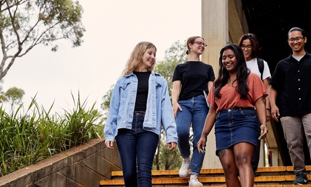 Students walking down outdoor stairs