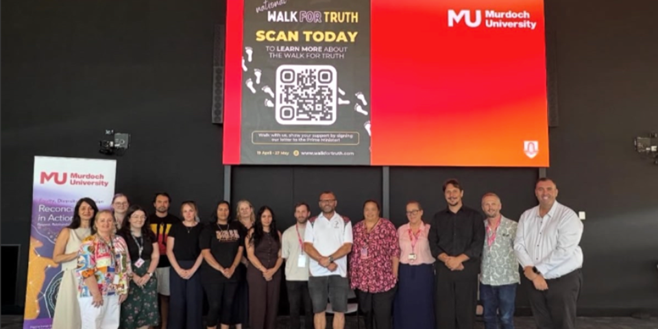 Travis Lovett with attendees at his talk at Murdoch University.