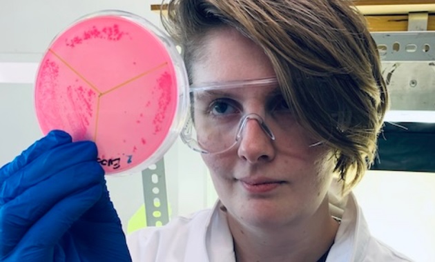 BIH researcher with sample