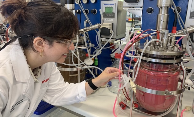Researcher with machine