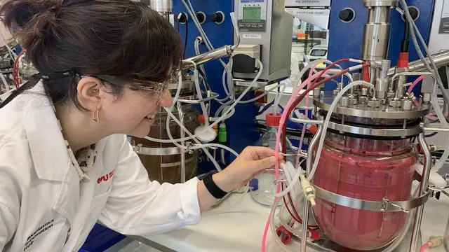 Researcher with machine