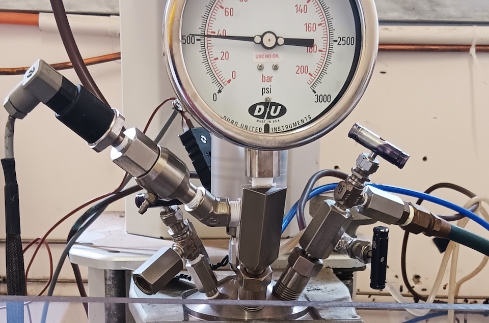 Photo of HBI Autoclave lab equipment and meter