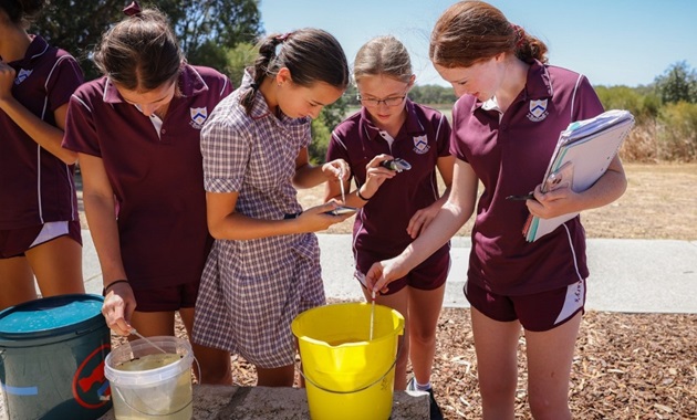 St Marys students undertaking water sampling