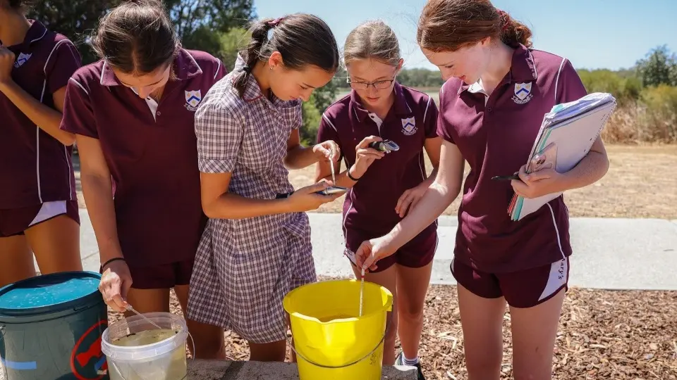St Marys students undertaking water sampling