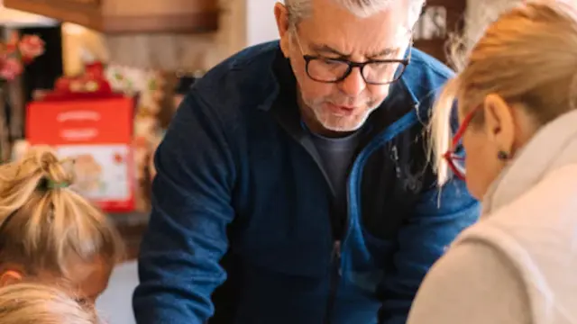 Older man with family