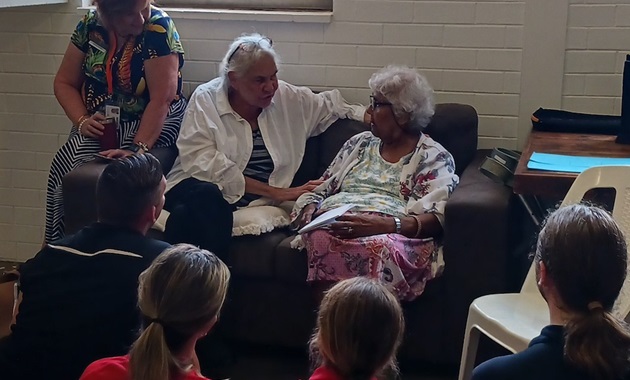 Group of students and Elders talking