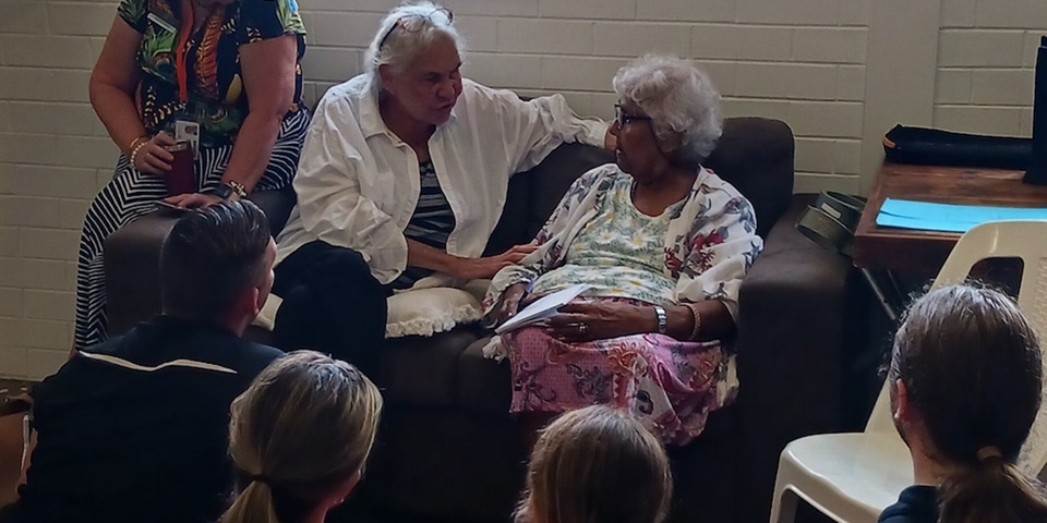 Group of students and Elders talking