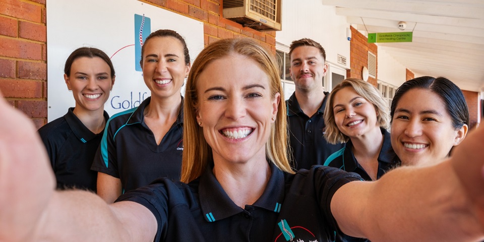 Cindy and team smiling