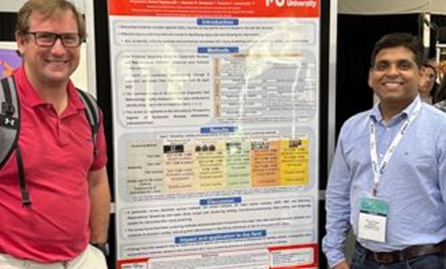 Manoj presenting a poster