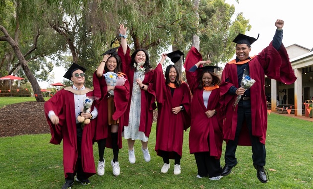 Murdoch graduates cheering