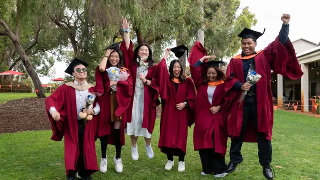 Murdoch graduates cheering