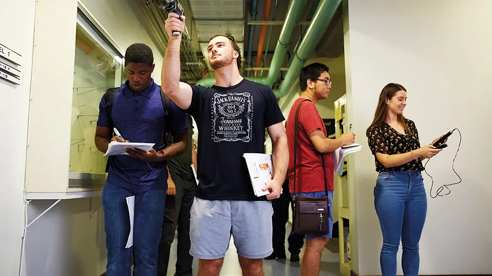 Students using measurement equipment