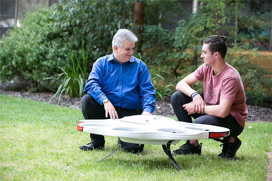 2 males with dronecopter