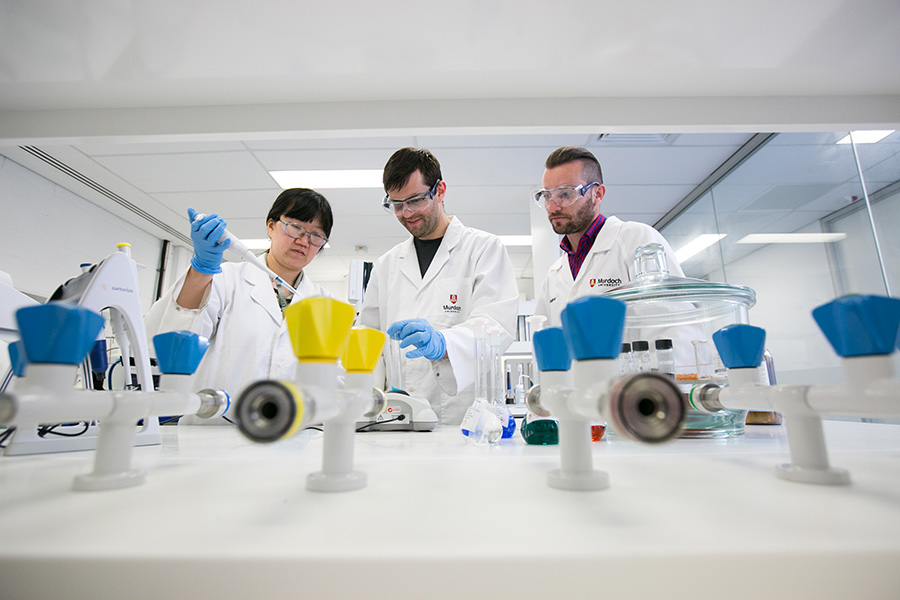 3 researchers in a lab