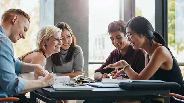 Students chatting around a table