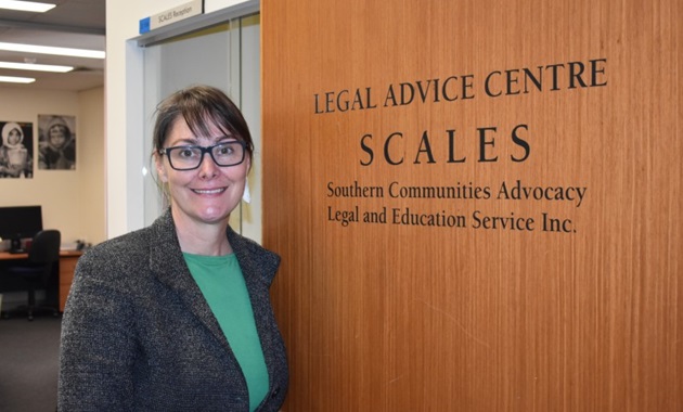 Anna Copeland in front of SCALES door