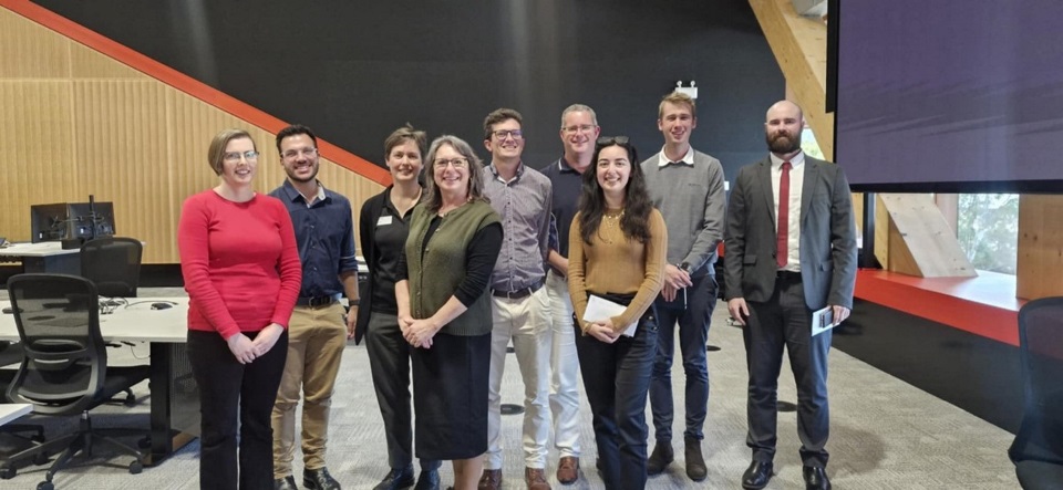 Dr Brendan Florio (centre), Murdoch University with colleagues and professional mathematicians at WAMS 2025