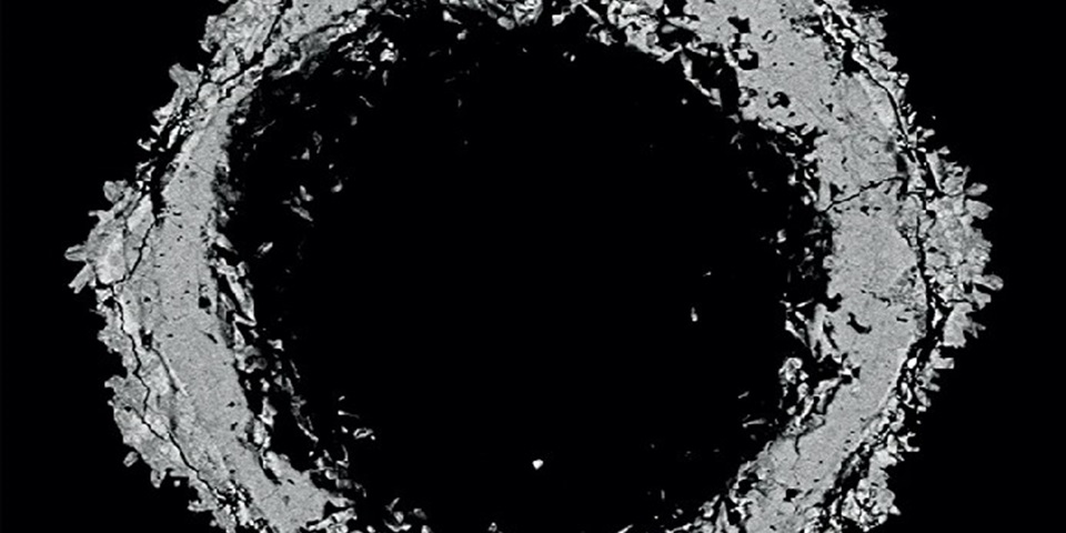 Hexagonal rhabdophane pseudomorph — a replacement product of a previous mineral that preserves the original mineral’s shape — from the Mont Saint-Hilaire pegmatite, Canada. Sample provided by Inna Lykova, Canadian Museum of Nature.