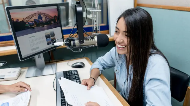 student recording for radio