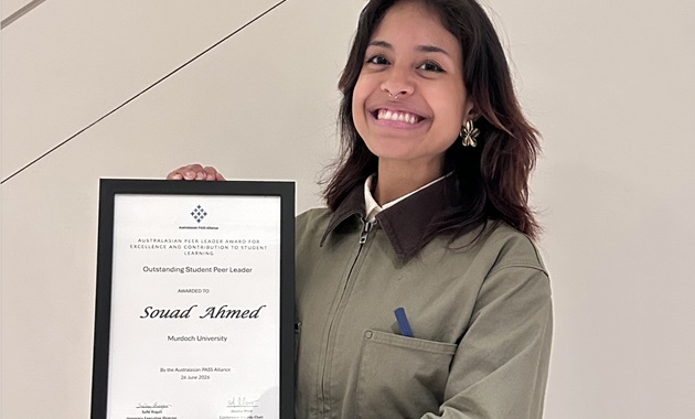 Sue Ahmed with award