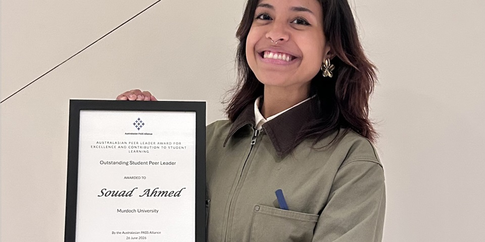 Sue Ahmed with award