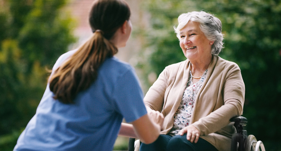 Nurse supporting woman