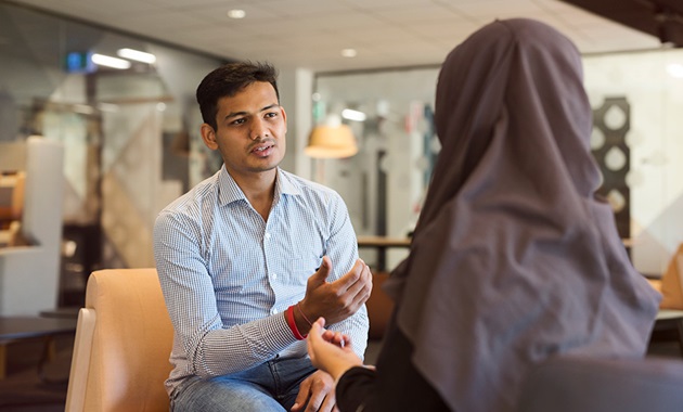 Psychology student speaking with patient