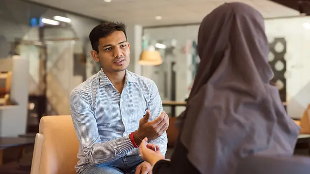 Psychology student speaking with patient