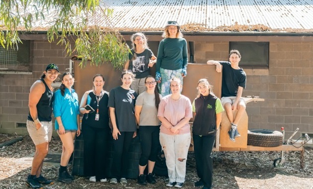 Group of people preparing for a road trip