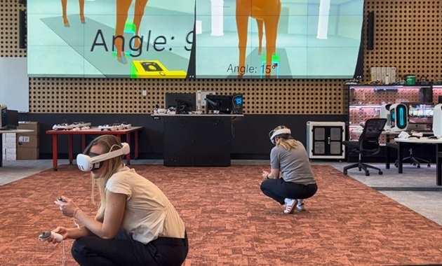 Two students wearing headsets for virtual learning